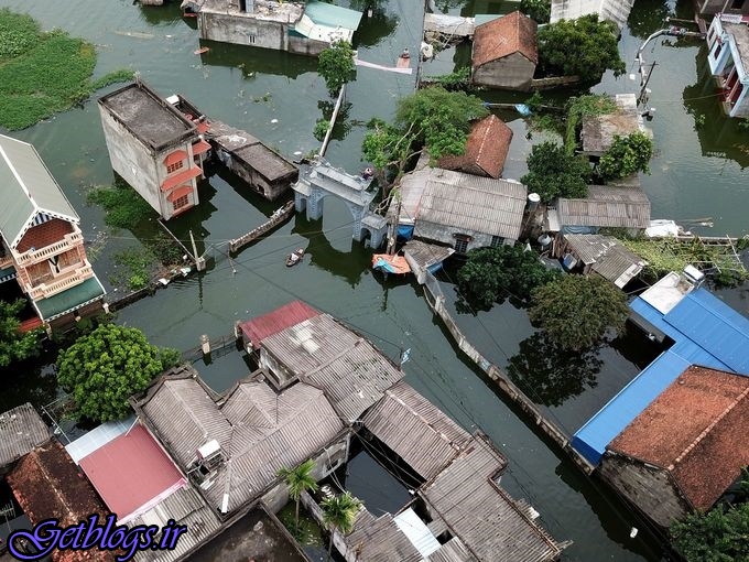 تصاویر ، قایق سواری در خیابان‌های ویتنام